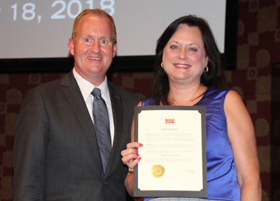 Chapter treasurer receiving the Constitution Week Proclamation from the Mayor of Frisco. Texas.