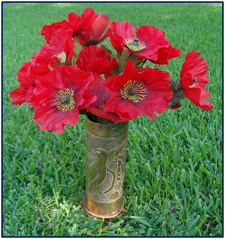  Embossed brass vase made from a World War I German shell casing