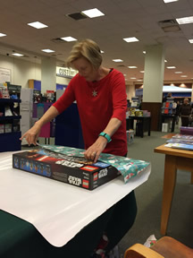 Preston Ridge member is hard at work wrapping gifts at Barnes & Noble for a chapter fundraiser.