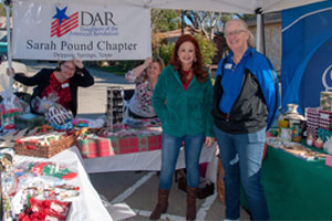 The chapter booth at Christmas on Mercer in Dripping Springs.