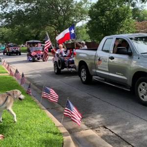 Chapter members participating in neighborhood 4th of July parade in Fort Worth.